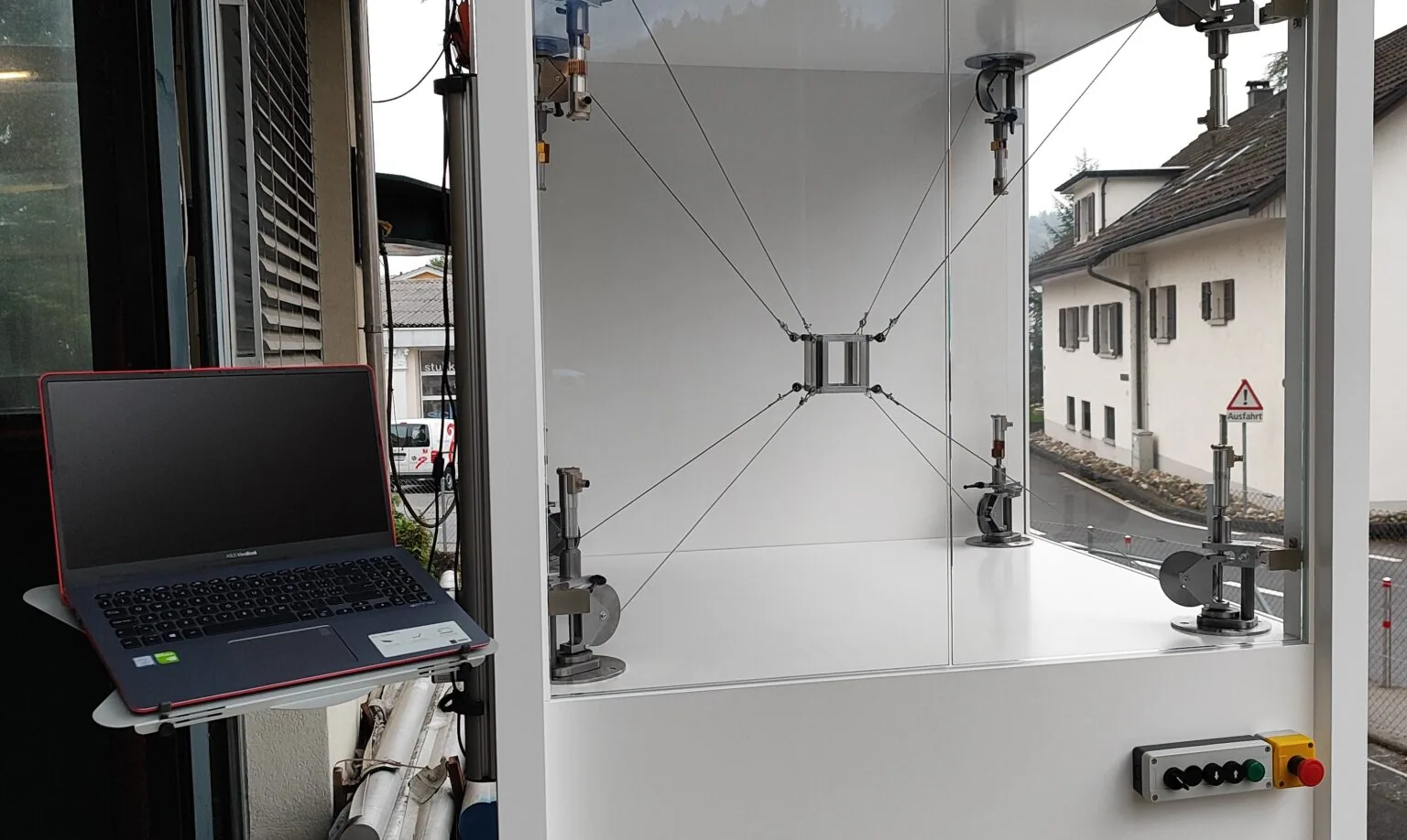 Original photograph of the Trimed cable robot with central platform and cable drives
